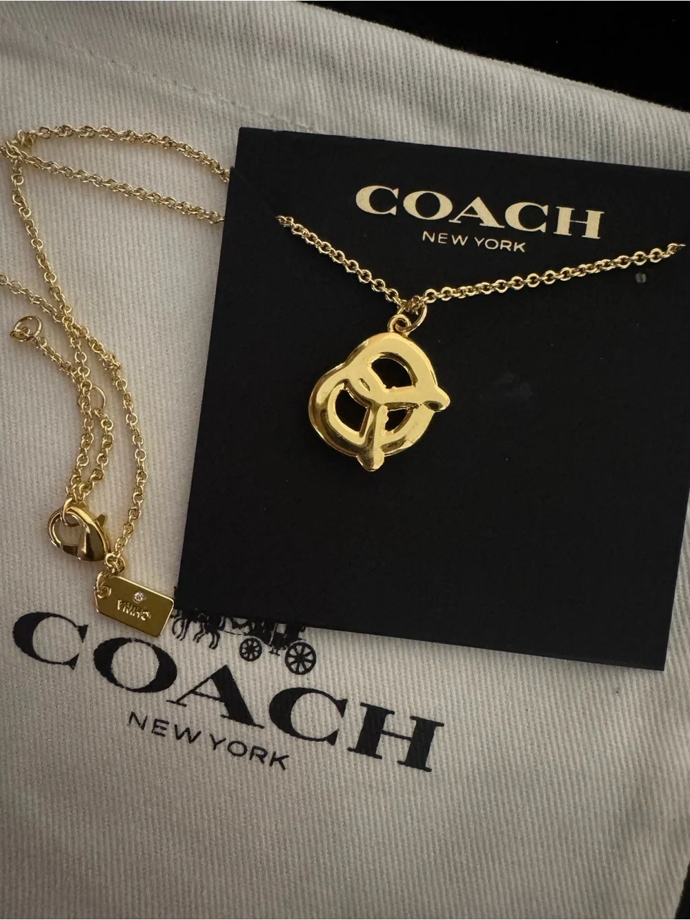 Coach Gold Pretzel Pendant Necklace with Pink Accents